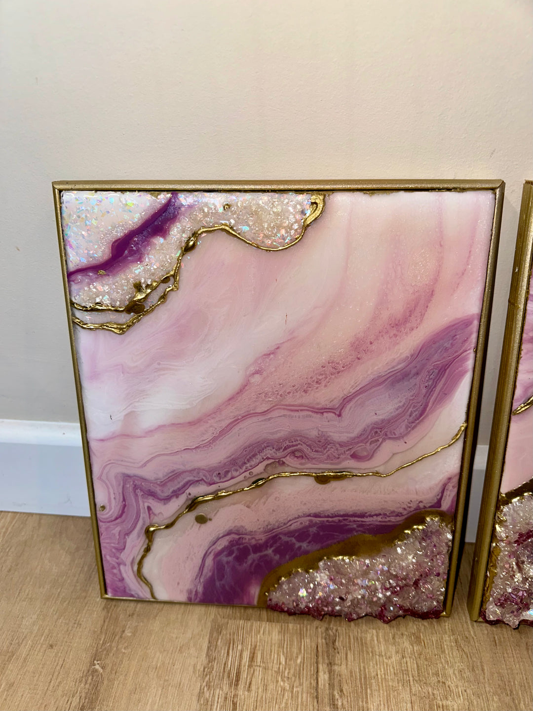 Pink and gold resin geode triptych with crushed crystal texture and gold framing.